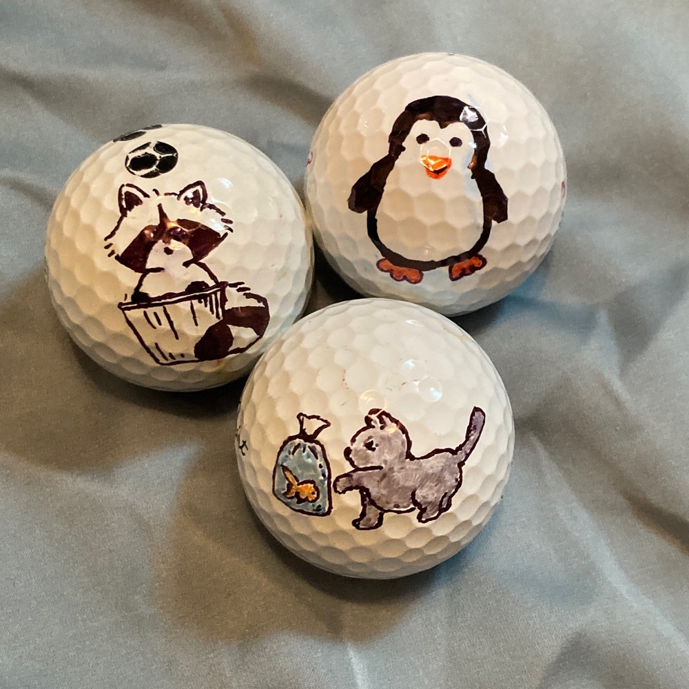 Cute hand drawn animal golf balls